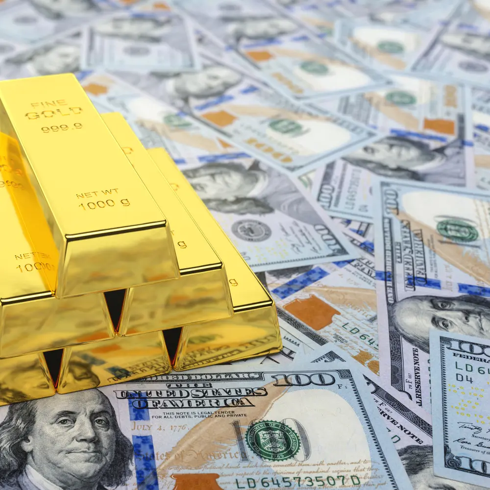 العلاقة بين الدولار وسعر الذهب
